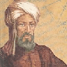 A wise old man with a beard and head garment