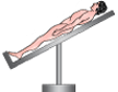 Person laying on a tilt-table